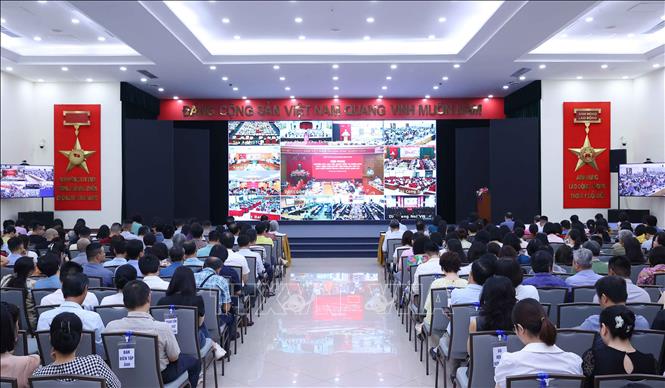 Đảng viên thuộc Đảng bộ Thông tấn xã Việt Nam tham dự Hội nghị trực tuyến tại điểm cầu trụ sở Thông tấn quốc gia (số 5 Lý Thường Kiệt, Hà Nội). Ảnh: Văn Điệp – TTXVN
