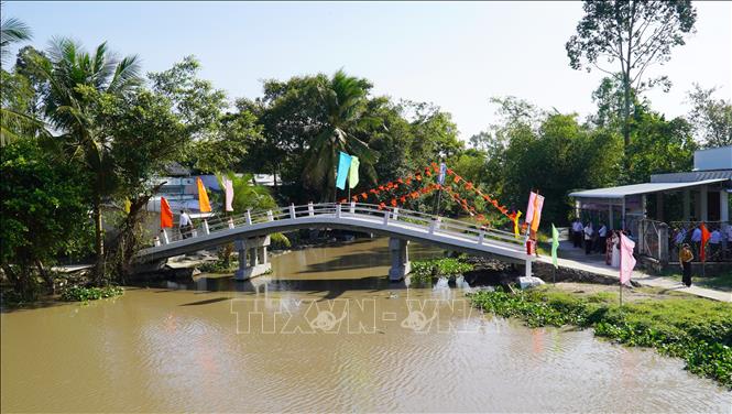 Cầu giao thông nông thôn tại xã Ngọc Chúc vừa được Ủy ban Mặt trận Tổ quốc Việt Nam tỉnh An Giang vận động xây dựng, hoàn thành tháng 8/2026. Ảnh: Văn Sĩ - TTXVN                               