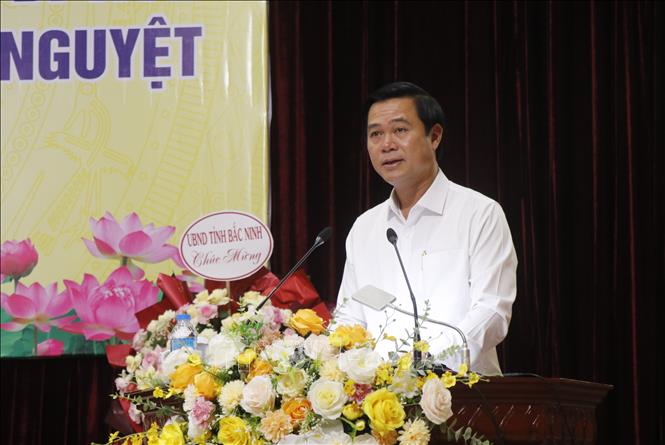 Phó Chủ tịch UBND tỉnh Bắc Ninh Lê Xuân Lợi phát biểu tại Hội thảo. Ảnh: Thanh Thương- TTXVN