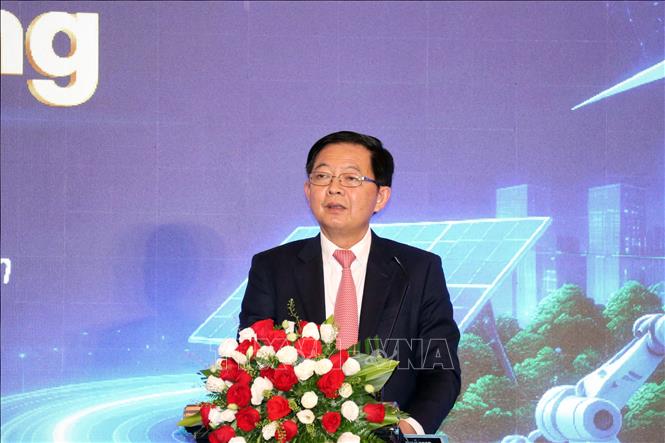 Phó Thủ tướng Chính phủ Hồ Quốc Dũng phát biểu tại Diễn đàn. Ảnh: Tiến Lực - TTXVN