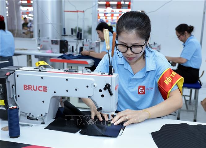 Thí sinh đến từ Công ty may Hồ Gươm. Ảnh: Trần Việt - TTXVN