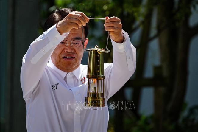 Nghi thức thắp đuốc ASIAD 2026 tại sân vận động quốc gia Nhật Bản ở Tokyo ngày 18/8/2026. Ảnh: THX/TTXVN phát