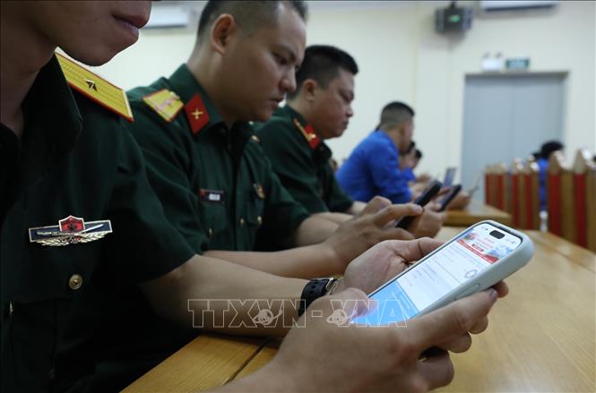 Các đại biểu, cán bộ, đoàn viên, thanh niên tại các điểm cầu cùng tham gia thi thử Cuộc thi trên hệ thống phần mềm. Ảnh: Anh Tuấn – TTXVN