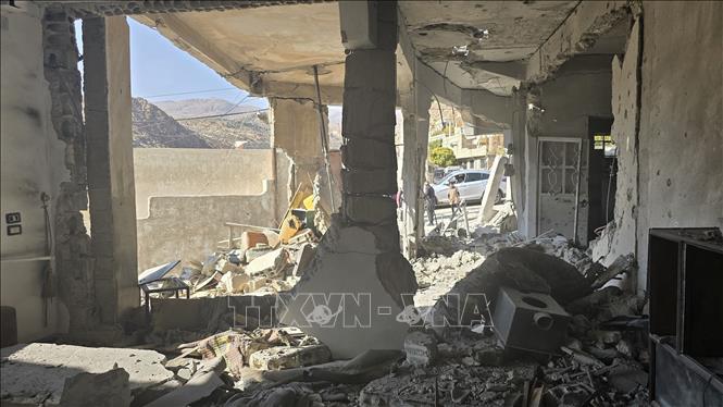 (Tư liệu) Ngôi nhà bị phá hủy sau các cuộc không kích của Israel xuống Beit Jinn, Syria. Ảnh: THX/TTXVN phát