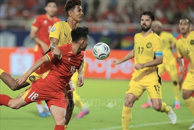 Pha đi bóng của Hai Long. Ảnh: Minh Quyết - TTXVN