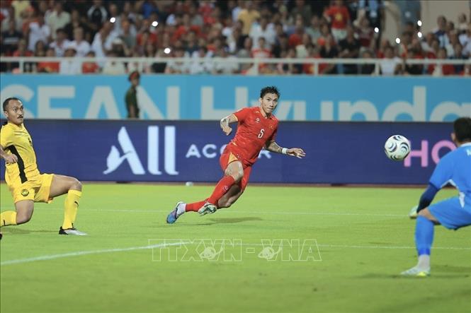 Kết thúc hiệp 1, hai đội hoà nhau với tỷ số 0-0. Ảnh: Minh Quyết - TTXVN