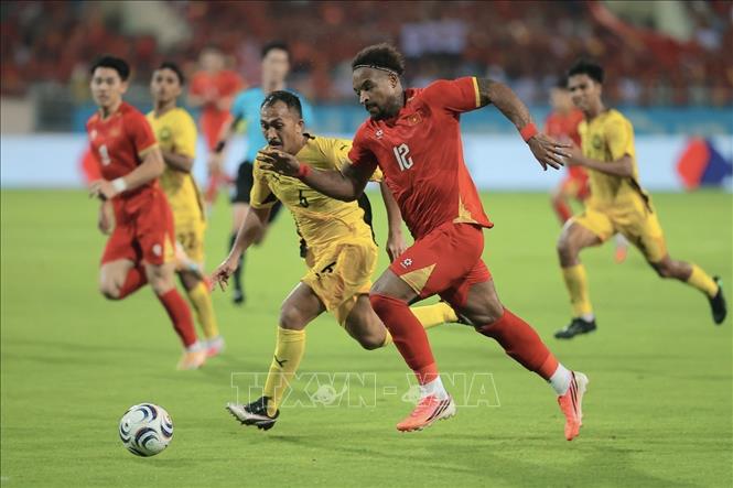 Xuân Son ghi bàn thắng ấn định chiến thắng 2-0 cho đội tuyển Việt Nam ở phút 89. Ảnh: Minh Quyết - TTXVN