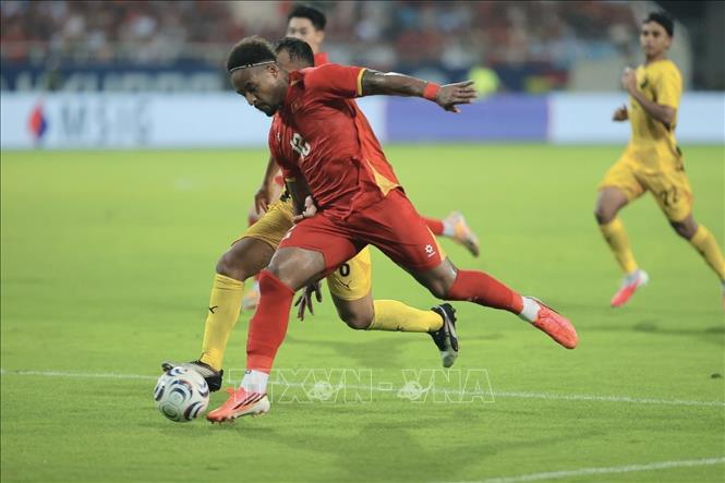 Xuân Son ghi bàn thắng ấn định chiến thắng 2-0 cho đội tuyển Việt Nam ở phút 89. Ảnh: Minh Quyết - TTXVN