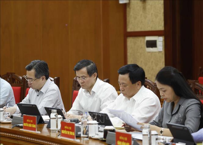 Các đại biểu tham dự buổi làm việc. Ảnh: Thống Nhất - TTXVN