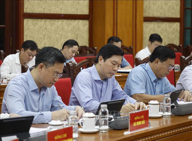 Các đại biểu tham dự buổi làm việc. Ảnh: Thống Nhất - TTXVN