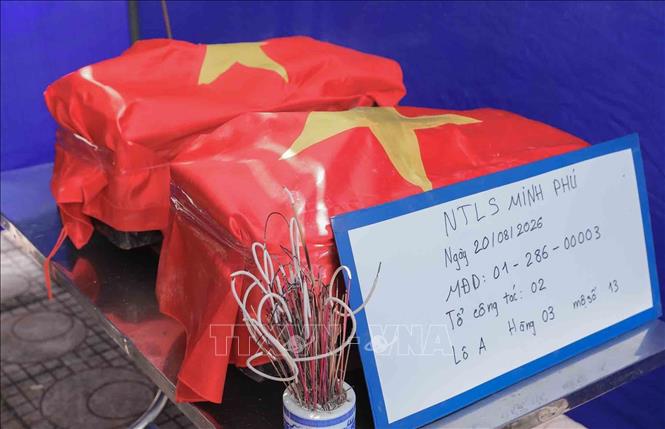 Hài cốt liệt sĩ được đặt tại nhà quàn, chuẩn bị trang nghiêm trước khi tổ chức lễ truy điệu và an táng. Ảnh: Phan Phương – TTXVN