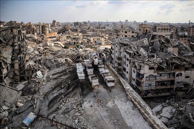 Những tòa nhà bị phá hủy do xung đột tại Dải Gaza. Ảnh: THX/TTXVN phát
