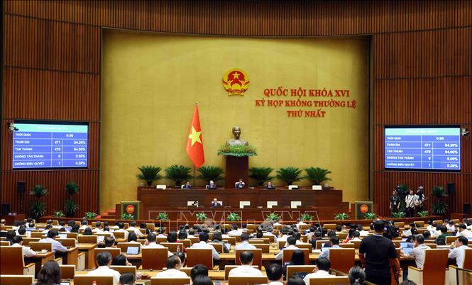 Quốc hội biểu quyết thông qua Luật sửa đổi, bổ sung một số điều của Luật Trách nhiệm bồi thường của Nhà nước. Ảnh: Phạm Kiên - TTXVN
