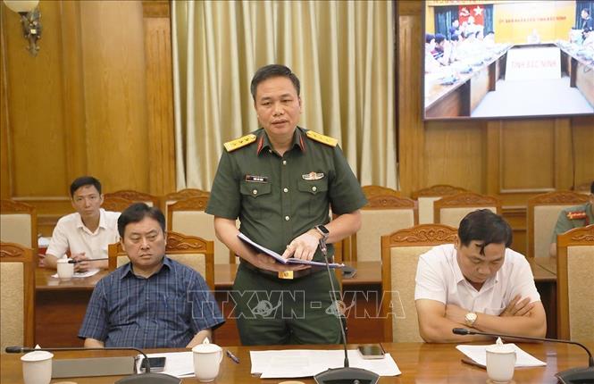 Đại diện Bộ Chỉ huy Quân sự tỉnh Bắc Ninh báo cáo tại hội nghị. Ảnh: Thái Hùng - TTXVN