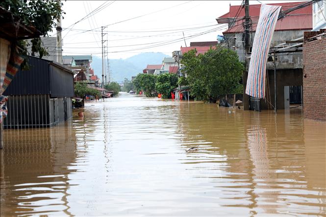 Tuyến đường xã Tràng Định, tỉnh Lạng Sơn biến thành sông sau những đợt mưa lớn liên tục kéo dài do ảnh hưởng của bão số 4. Ảnh: Văn Đạt - TTXVN