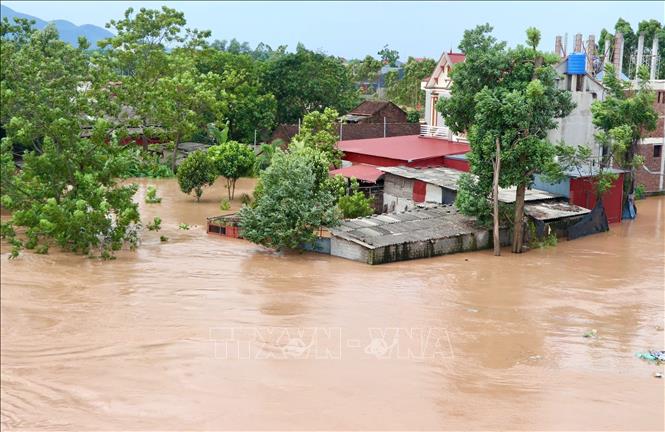 Mực nước sông Lục Nam tiếp tục ở mức cao, đạt 7,15 m, trên báo động III là 0,85 m. Ảnh: Thái Hùng - TTXVN