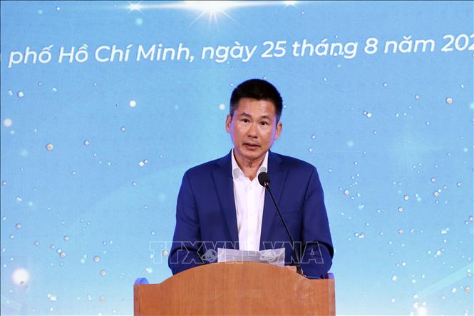 Giám đốc Công ty cổ phần Quỹ đầu tư mạo hiểm TP. Hồ Chí Minh Hoàng Đức Trung báo cáo tại buổi lễ. Ảnh: Tiến Lực - TTXVN