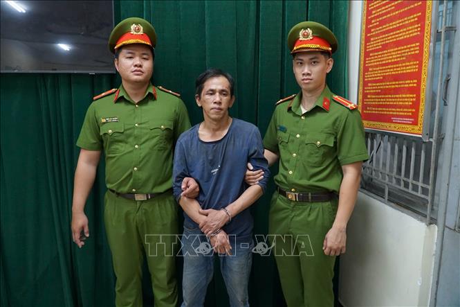 Đối tượng Trương Xuân Huy tại cơ quan công an. Ảnh: TTXVN phát