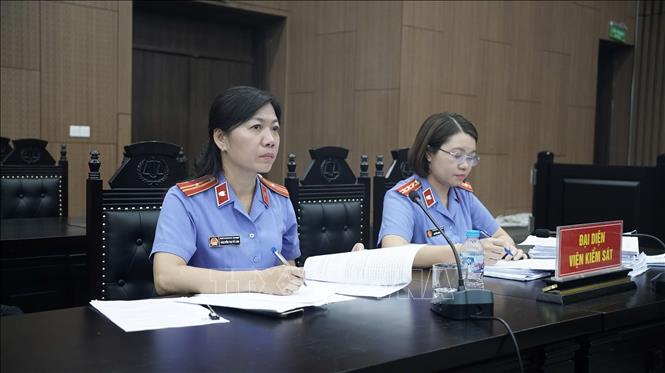 Đại diện Viện Kiểm sát giữ quyền công tố tại phiên tòa. Ảnh: Kim Anh - TTXVN