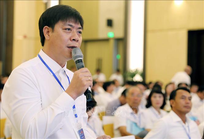 Ông Ninh Văn Sức - Chủ tịch HĐQT Tập đoàn Việt Hưng ý kiến về việc tỉnh xây dựng đầu mối điều phối tổng thể để tạo điều kiện cho doanh nghiệp. Ảnh: Việt Hoàng - TTXVN