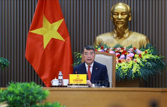 Thủ tướng Lê Minh Hưng điện đàm với Thủ tướng Đức Friedrich Merz. Ảnh: Dương Giang – TTXVN 