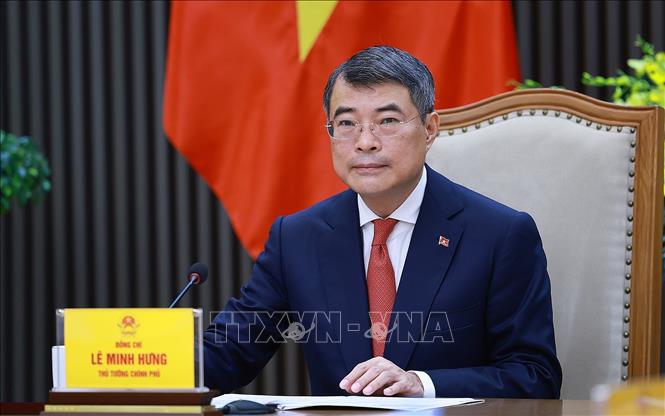 Thủ tướng Lê Minh Hưng điện đàm với Thủ tướng Đức Friedrich Merz. Ảnh: Dương Giang – TTXVN 