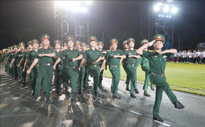 Các đoàn tiến vào lễ đài. Ảnh: Công Phong - TTXVN