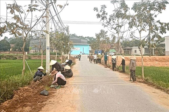 Phong trào giữ gìn vệ sinh, chỉnh trang cảnh quan được người dân tích cực hưởng ứng, góp phần lan tỏa nếp sống xanh ở khu dân cư. Ảnh: Nguyễn Thảo - TTXVN