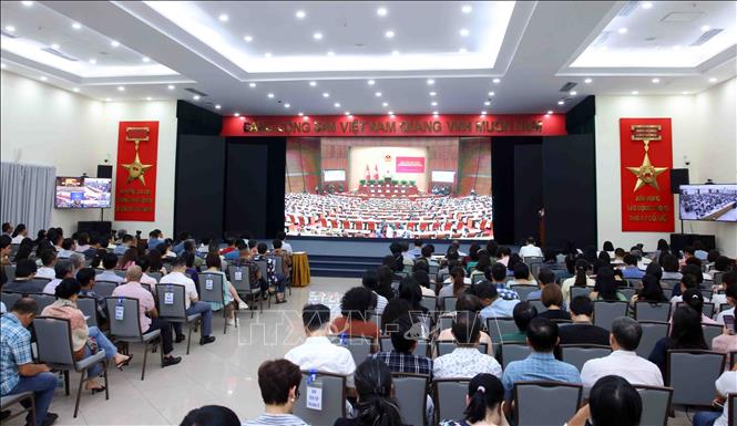 Đảng viên thuộc Đảng bộ Thông tấn xã Việt Nam tham dự Hội nghị trực tuyến tại điểm cầu trụ sở Thông tấn Quốc gia (5 Lý Thường Kiệt, Hà Nội). Ảnh: Phạm Kiên - TTXVN