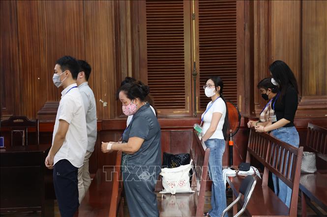 Các bị cáo nghe tuyên án tại điểm cầu trung tâm Tòa án nhân dân TP. Hồ Chí Minh. Ảnh: Hồng Đạt - TTXVN