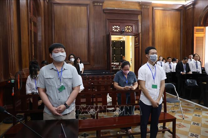 Các bị cáo nghe tuyên án tại điểm cầu trung tâm Tòa án nhân dân TP. Hồ Chí Minh. Ảnh: Hồng Đạt - TTXVN