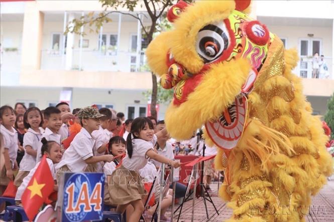 Niềm vui hân hoan của học sinh Thủ đô trong ngày khai giảng năm học mới 2023-2024. Ảnh: Minh Quyết - TTXVN