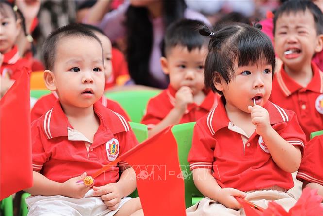 Học sinh Trường mầm non Kim Liên (Hà Nội) tham dự lễ Khai giảng năm học mới. Ảnh: Lê Đông - TTXVN