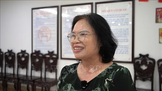 Bà Đỗ Thu Hà (trú tại phố Nguyễn Công Trứ, Hà Nội) nhận định việc lấy ý kiến về điều chỉnh Quy hoạch phân khu đô thị sông Hồng là rất cần thiết. Ảnh: Hùng Mạnh - TTXVN.