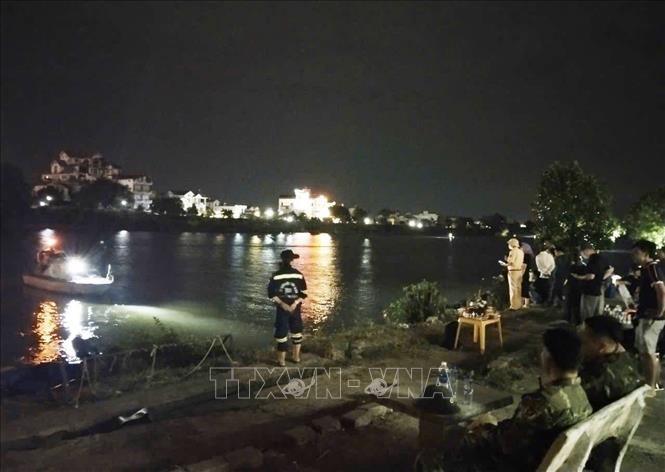 Công tác tìm kiếm cứu nạn đối với công dân Đ.V. L vẫn được triển khai. Ảnh: Nguyễn Công Hải - TTXVN
