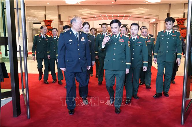 Đại tướng Phan Văn Giang gặp Phó Chủ tịch Quân ủy Trung ương Trung Quốc Trương Thăng Dân. Ảnh: TTXVN phát