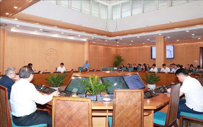 Hội nghị tiếp nhận, tổng hợp ý kiến và trả lời nhân dân về điều chỉnh tổng thể Quy hoạch phân khu đô thị sông Hồng. Ảnh: Vũ Quang - TTXVN