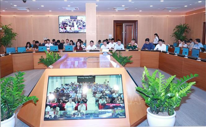 Gội nghị tiếp nhận, tổng hợp ý kiến và trả lời nhân dân về điều chỉnh tổng thể Quy hoạch phân khu đô thị sông Hồng. Ảnh: Vũ Quang - TTXVN