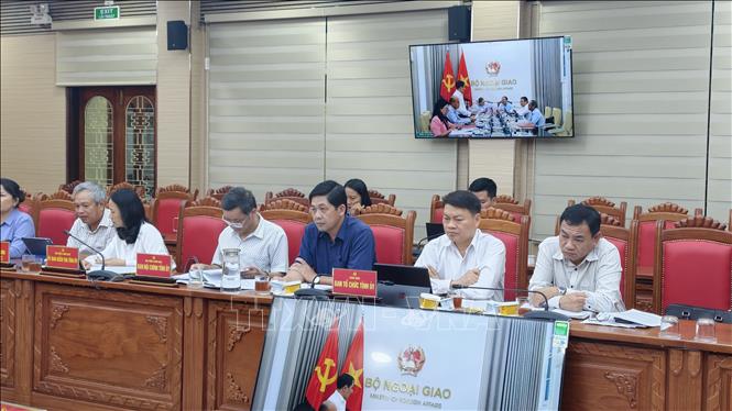 Các đại biểu tham dự buổi làm việc. Ảnh: Sỹ Thắng - TTXVN