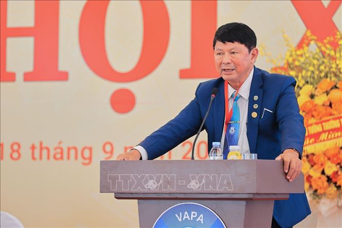 NSNA Đoàn Hoài Trung, Chủ tịch Hội Nhiếp ảnh Thành phố Hồ Chí Minh trình bày tham luận tại Đại hội. Ảnh: Lê Đông - TTXVN