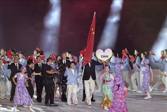Đoàn thể thao Trung Quốc diễu hành trong lễ khai mạc Đại hội Thể thao châu Á lần thứ 20 (ASIAD 20) tại thành phố Nagoya, Nhật Bản ngày 19/9/2026. Ảnh: THX/TTXVN phát