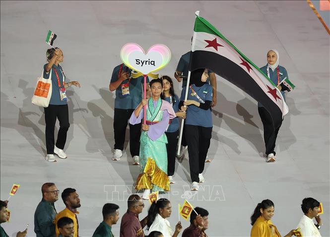 Đoàn thể thao Syria diễu hành trong lễ khai mạc Đại hội Thể thao châu Á lần thứ 20 (ASIAD 20) tại thành phố Nagoya, Nhật Bản ngày 19/9/2026. Ảnh: THX/TTXVN phát