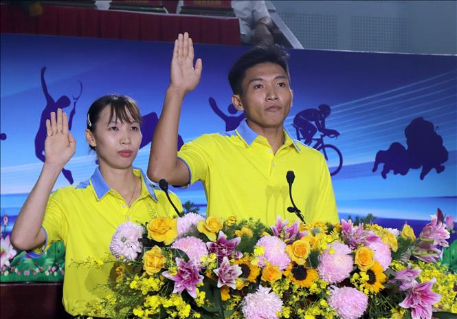 Vận động viên thực hiện nghi thức tuyên thệ tại đại hội. Ảnh: Lê Thúy Hằng – TTXVN