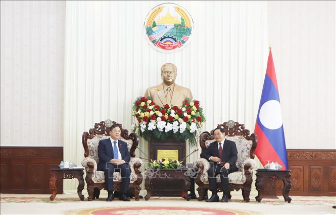 Thủ tướng Chính phủ Lào Sonexay Siphandone tiếp Phó Thủ tướng Thường trực Chính phủ Phạm Gia Túc. Ảnh: Xuân Tú - PV TTXVN tại Lào