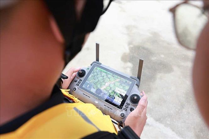 Các thiết bị UAV có thể xác định chính xác vị trí để di chuyển theo toạ độ và lộ trình đã cài đặt sẵn trên hệ thống. Ảnh: Ảnh: TTXVN phát