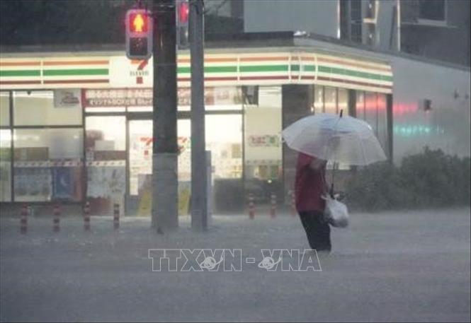 Cảnh ngập lụt sau những trận mưa lớn do bão Dujuan tại Ichikawa, tỉnh Chiba, Nhật Bản ngày 21/9/2026. Ảnh: Kyodo/TTXVN phát