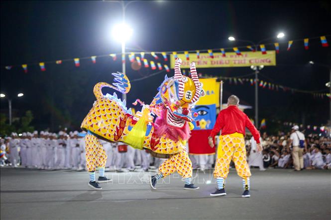 Performing the dances of Ngoc Ky Lan (Jade Unicorn) - one of the four sacred animals during the festival. VNA Photo: Giang Phương