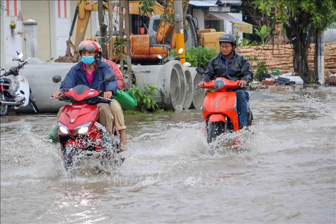 Đỉnh của đợt triều cường rằm tháng 8 âm lịch ở Cần Thơ dự báo lên mức 2,28m, vượt báo động III 0,28m. Ảnh: Thanh Liêm - TTXVN