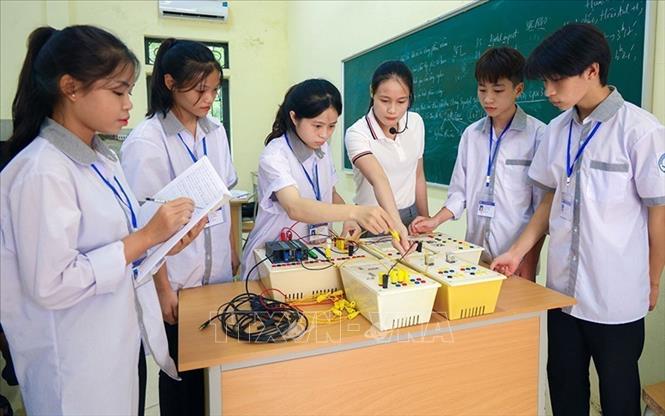 Các nội dung sửa đổi, bổ sung không làm thay đổi mục tiêu, cấu trúc, yêu cầu cần đạt và định hướng cơ bản của Chương trình giáo dục thường xuyên cấp THCS, THPT. Ảnh: Diệu Thúy- TTXVN 