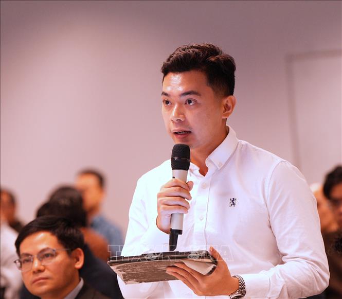 Chủ tịch Hội Sinh viên Việt Nam tại Australia Huỳnh Tấn Đạt đóng góp ý kiến về Nghị quyết 23. Ảnh: Trung Trang - P/v TTXVN tại Australia